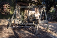 Wooden swing bench.