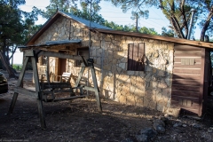 Outdoor view of cabins at sunset.