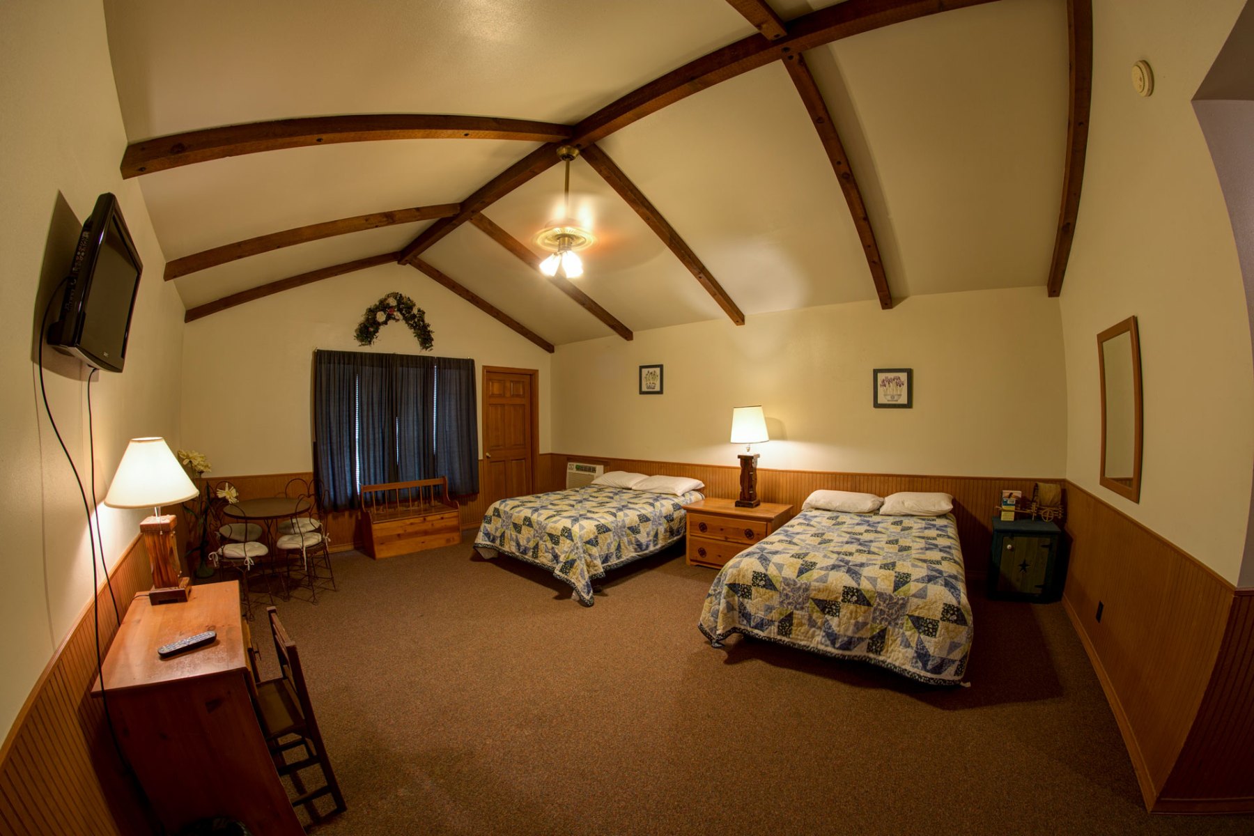 Double bed room with vaulted ceiling