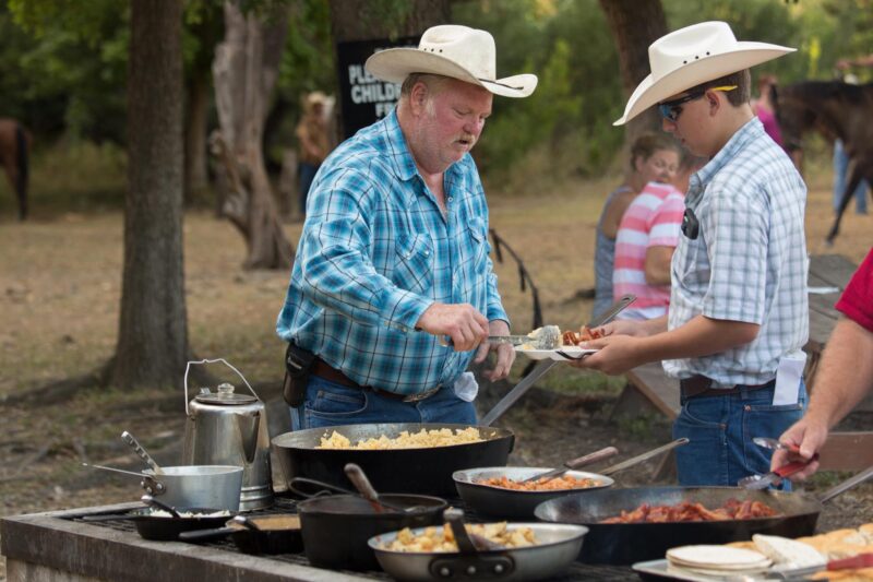 Timmy serving cowboy breakfast at Mayan Dude Ranch